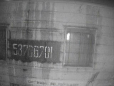 Пример успешно распознанного номера вагона (искусственное освещение, поврежденный номер)